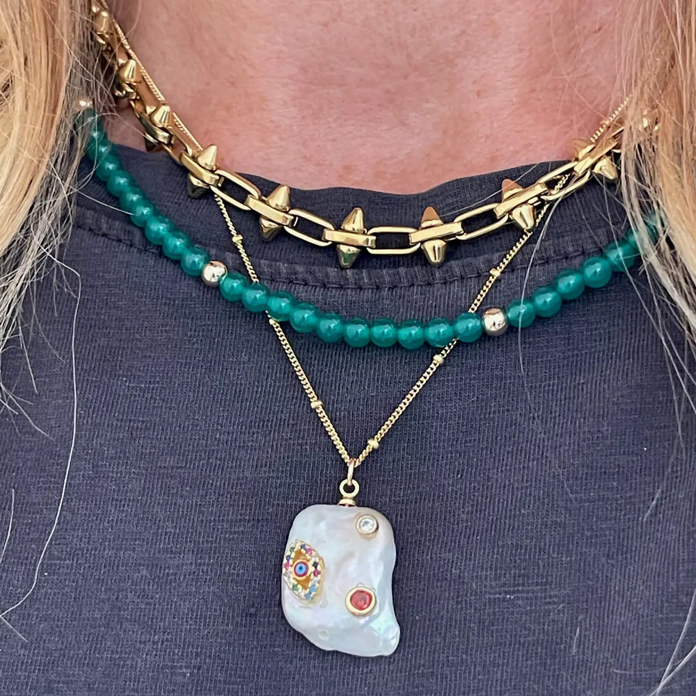 Woman wearing the Freya Necklace by Jessica Matrasko Jewelry