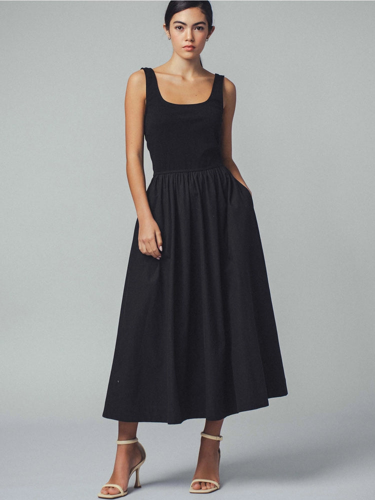 
                      
                        Shop this black fit and flare square neck cotton tank dress at Harbour Thread for chic and effortless summer style. 
                      
                    