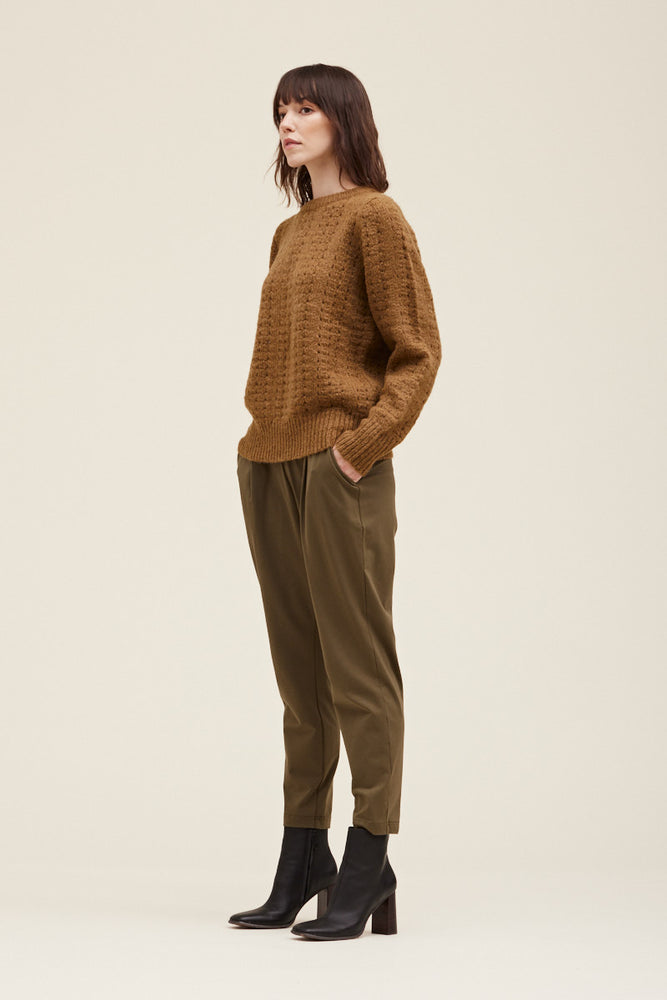 
                      
                        A versatile pullover sweater with a relaxed and contemporary fit. 
                      
                    