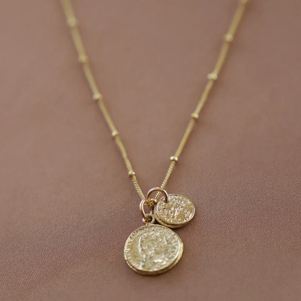 
                      
                        The Coin Charm Necklace by Katie Waltman Jewelry
                      
                    