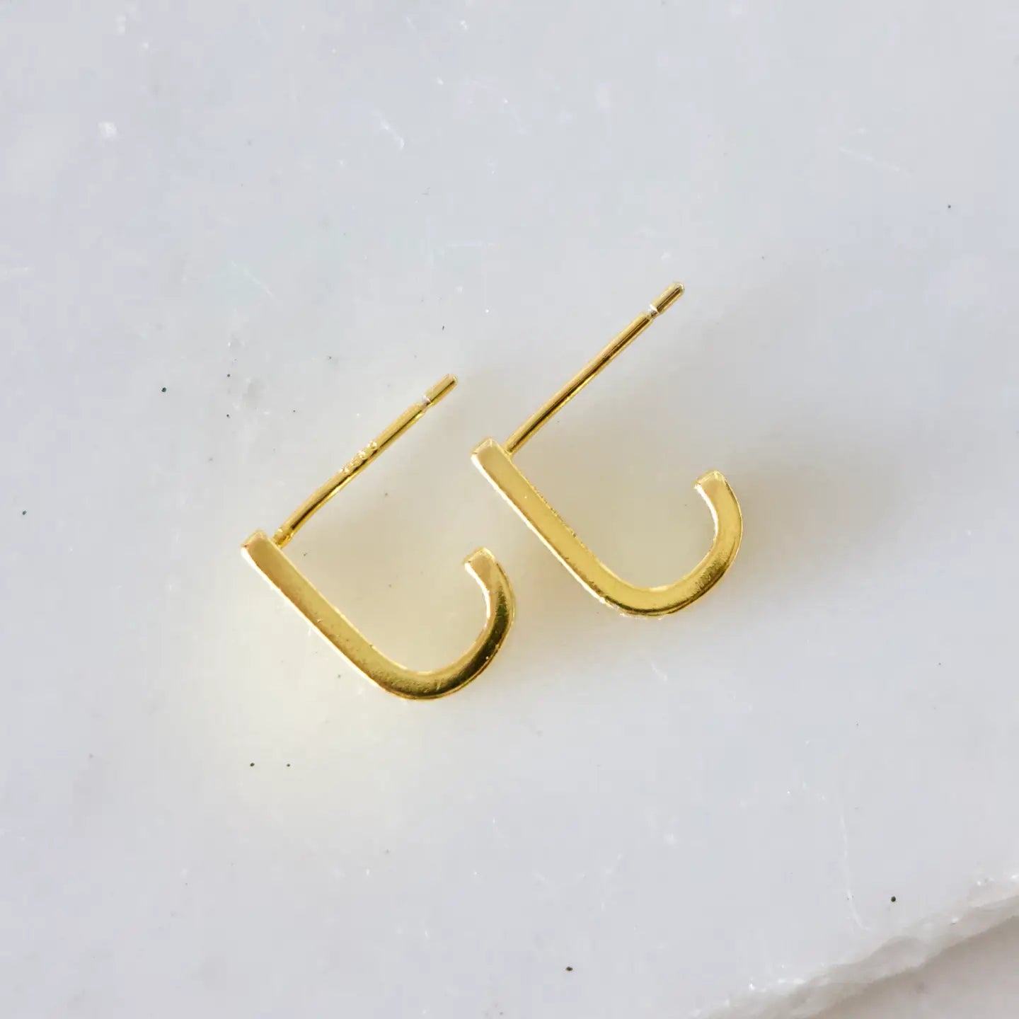 Side view of the Zircon Star U Shaped Earrings