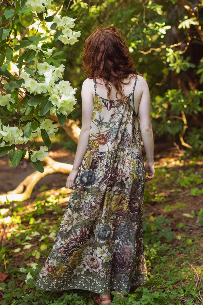 A woman wearing the Market of Stars Love Grows Wild Bohéme Long Slip Dress