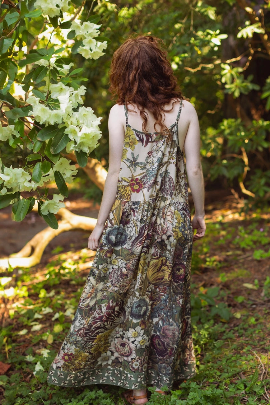 A woman wearing the Market of Stars Love Grows Wild Bohéme Long Slip Dress