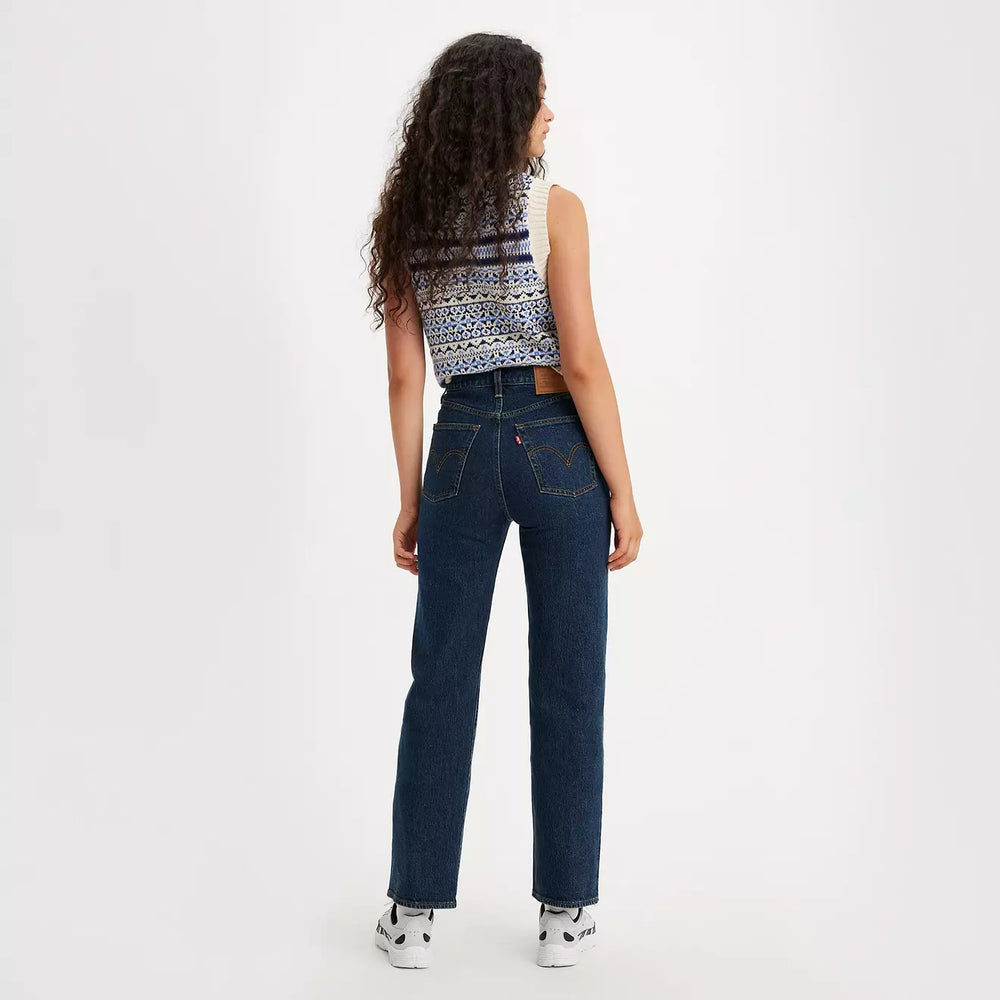 
                      
                        Back view of a woman wearing the Dark Stone Dark Wash Ribcage Straight Ankle Women's Jeans by Levi’s
                      
                    