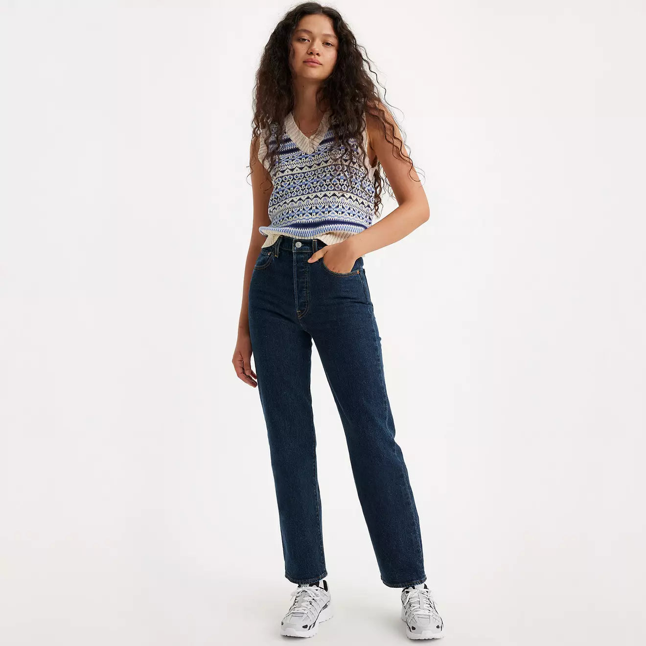 Front view of a woman wearing the Dark Stone Dark Wash Ribcage Straight Ankle Women's Jeans by Levi’s