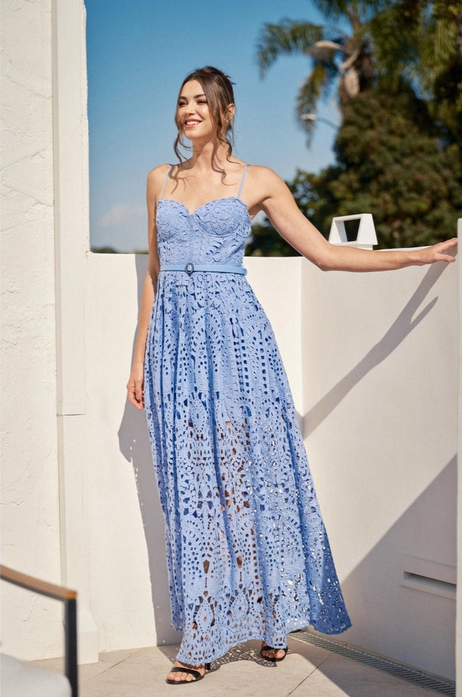 Perfect for formal summer events, this gorgeous belted maxi dress at Harbour Thread features intricate lace detailing throughout for a romantic and elegant look.