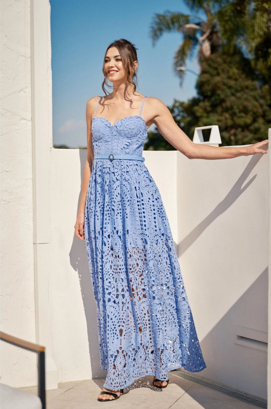 Perfect for formal summer events, this gorgeous belted maxi dress at Harbour Thread features intricate lace detailing throughout for a romantic and elegant look.