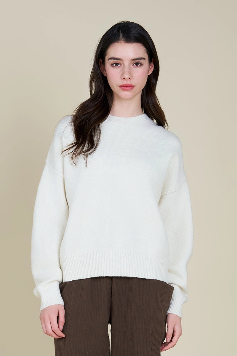 As the weather cools down, you'll be nice and cozy in this classic and comfortable mock neck sweater.