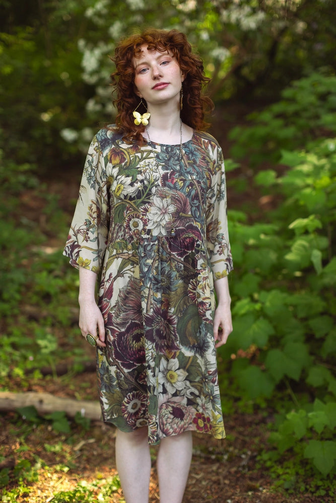 A woman wearing the Market of Stars Love Grows Wild Artist Dress Tunic