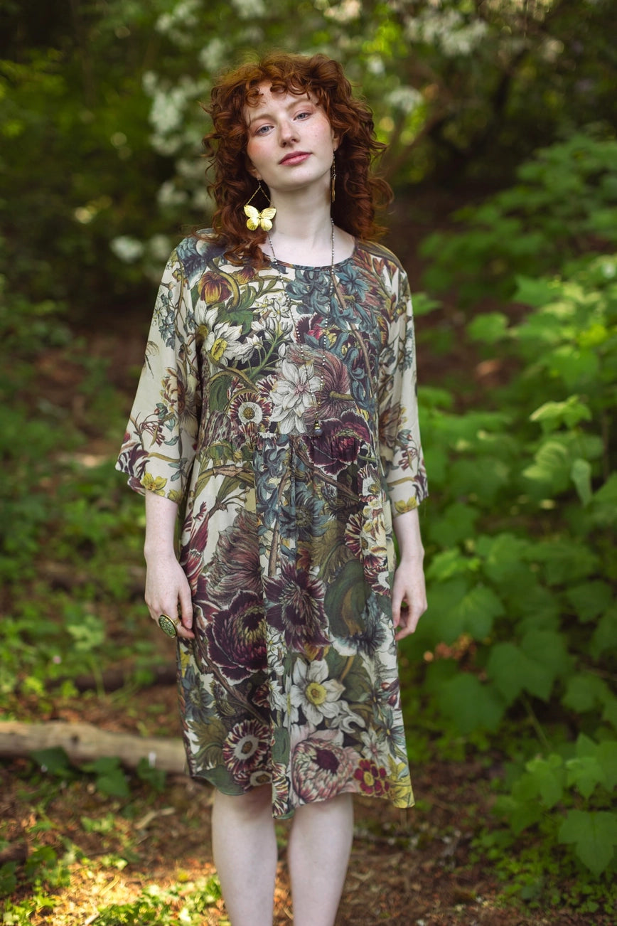 A woman wearing the Market of Stars Love Grows Wild Artist Dress Tunic