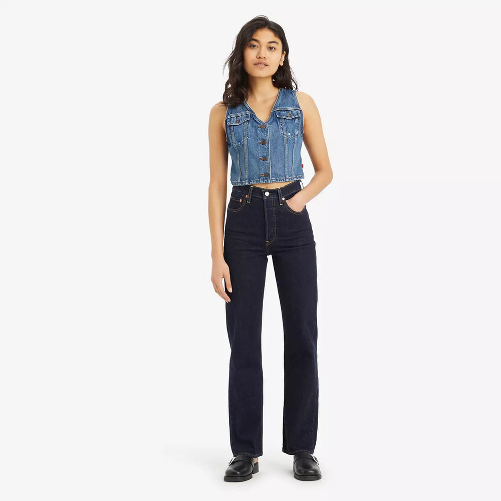 A woman wearing the Levi's Ribcage Full Length Women's Jeans in the color Small Course