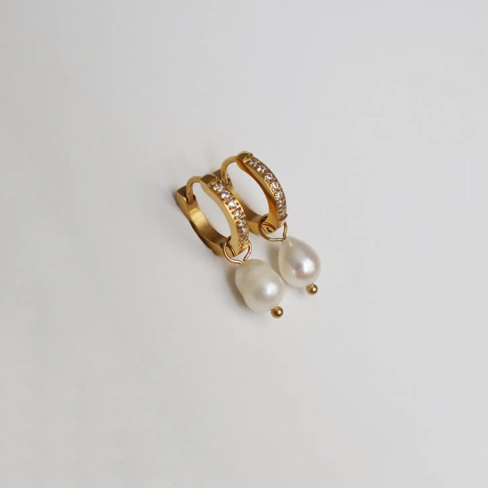 Jessa Jewelry's CZ Huggies Earrings with Pearl Drops.