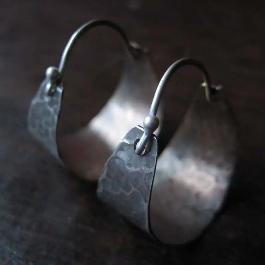 Shop the Small Wide Silver Hoop Earrings by local Vermont maker Jennifer Kahn Jewelry at Harbour Thread women's boutique in Burlington, VT. 