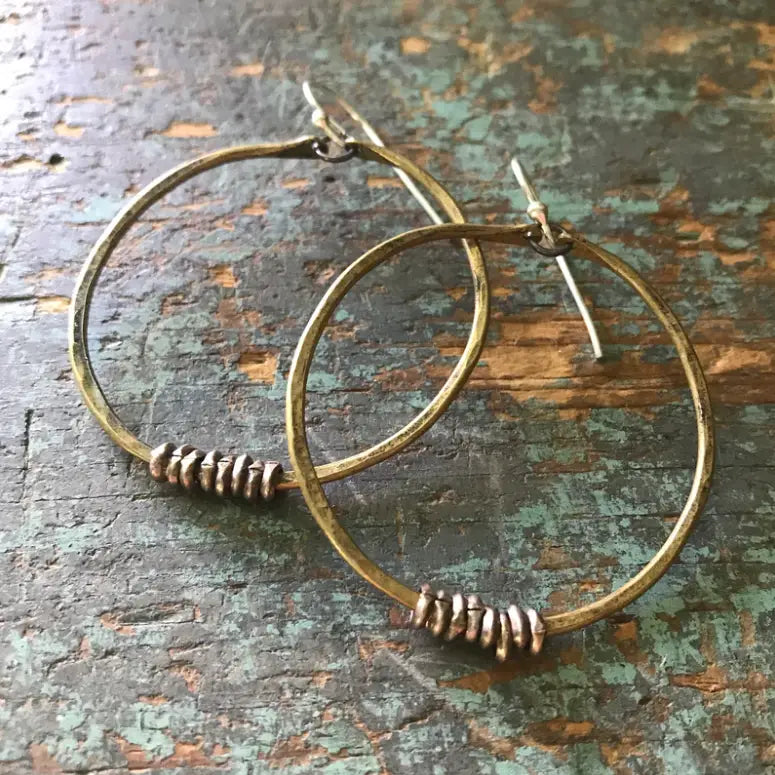 
                      
                        The Medium Brass Hoop Earrings with Heishi by Jennifer Kahn Jewelry
                      
                    