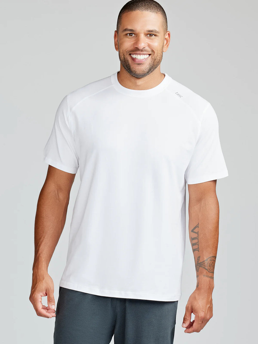 The white Carrollton Fitness T-Shirt by Tasc Performance