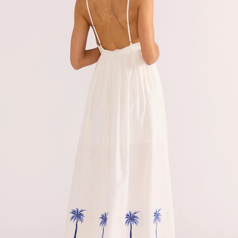 
                      
                        White midi dress with blue palm embroidery from MINKPINK
                      
                    