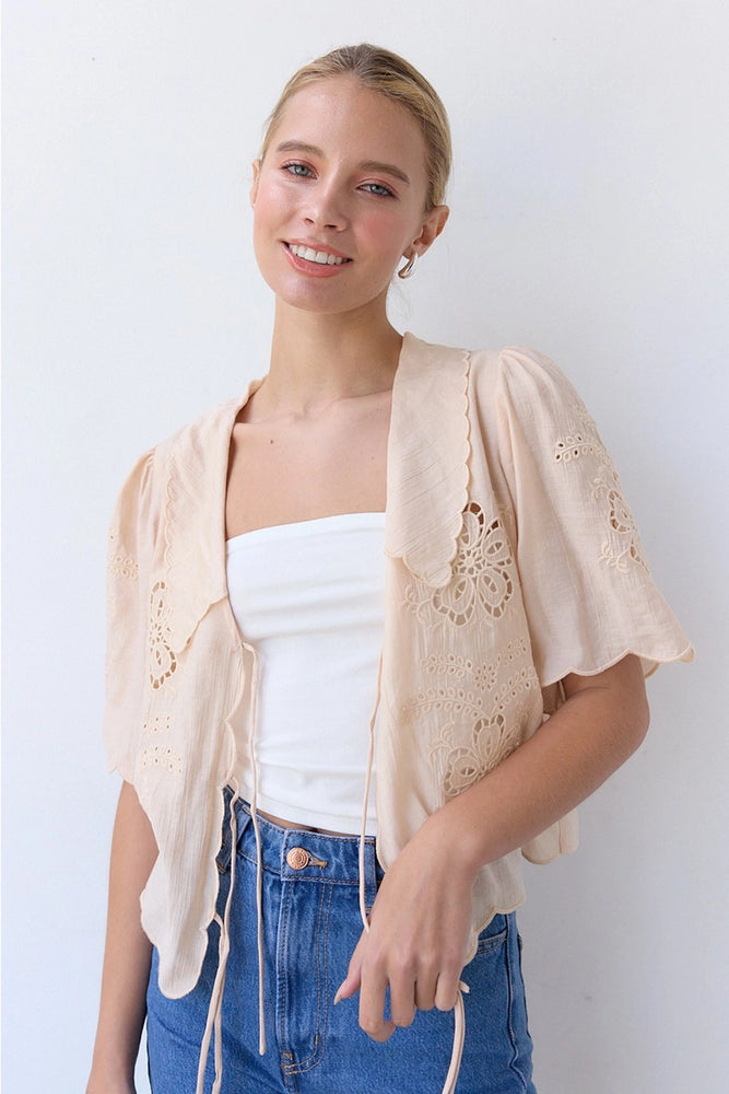 
                      
                        Embroidered Tie Front Blouse
                      
                    