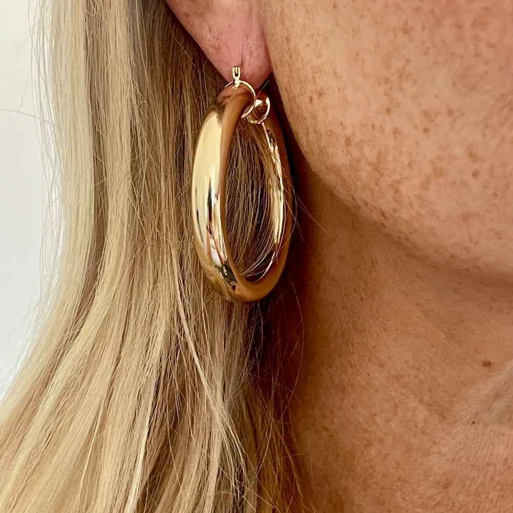 
                      
                        Woman wearing the Hilda Earrings by Jessica Matrasko Jewelry
                      
                    