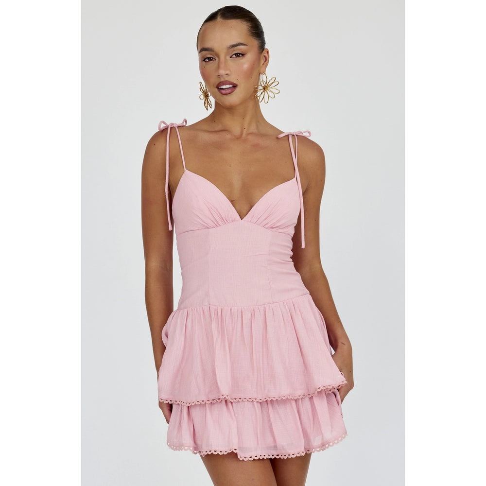 This fun mini dress at Harbour Thread Burlington offers a tiered ruffle skirt paired with flattering fitted bodice and self tie shoulder straps.