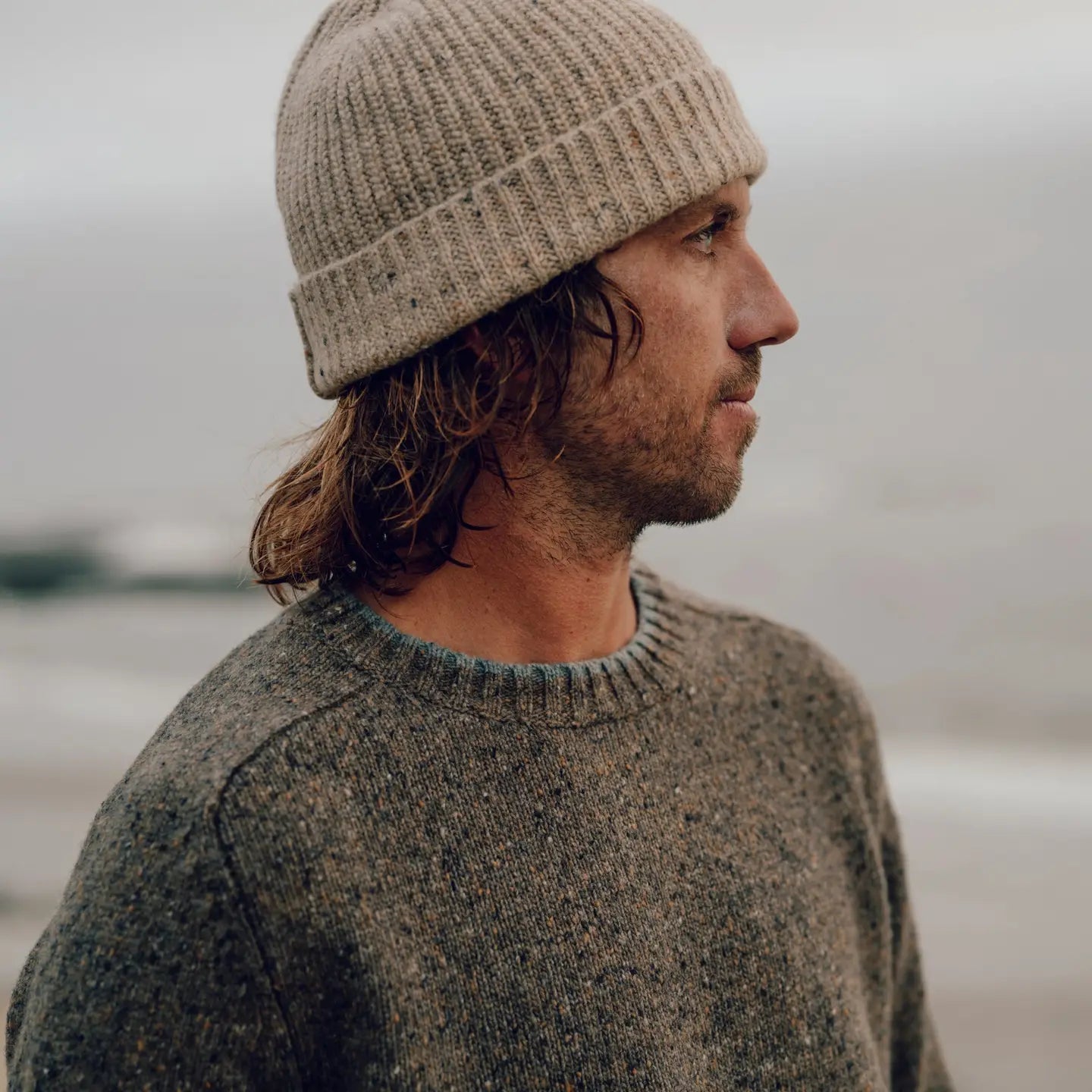 A mean wearing the Skiff Beanie by Mollusk