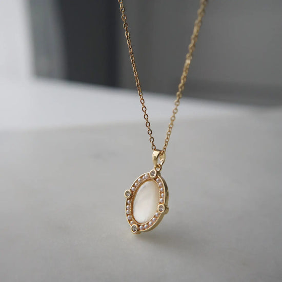 Jessa Jewelry's Aurora White Shell Pendant Necklace.
