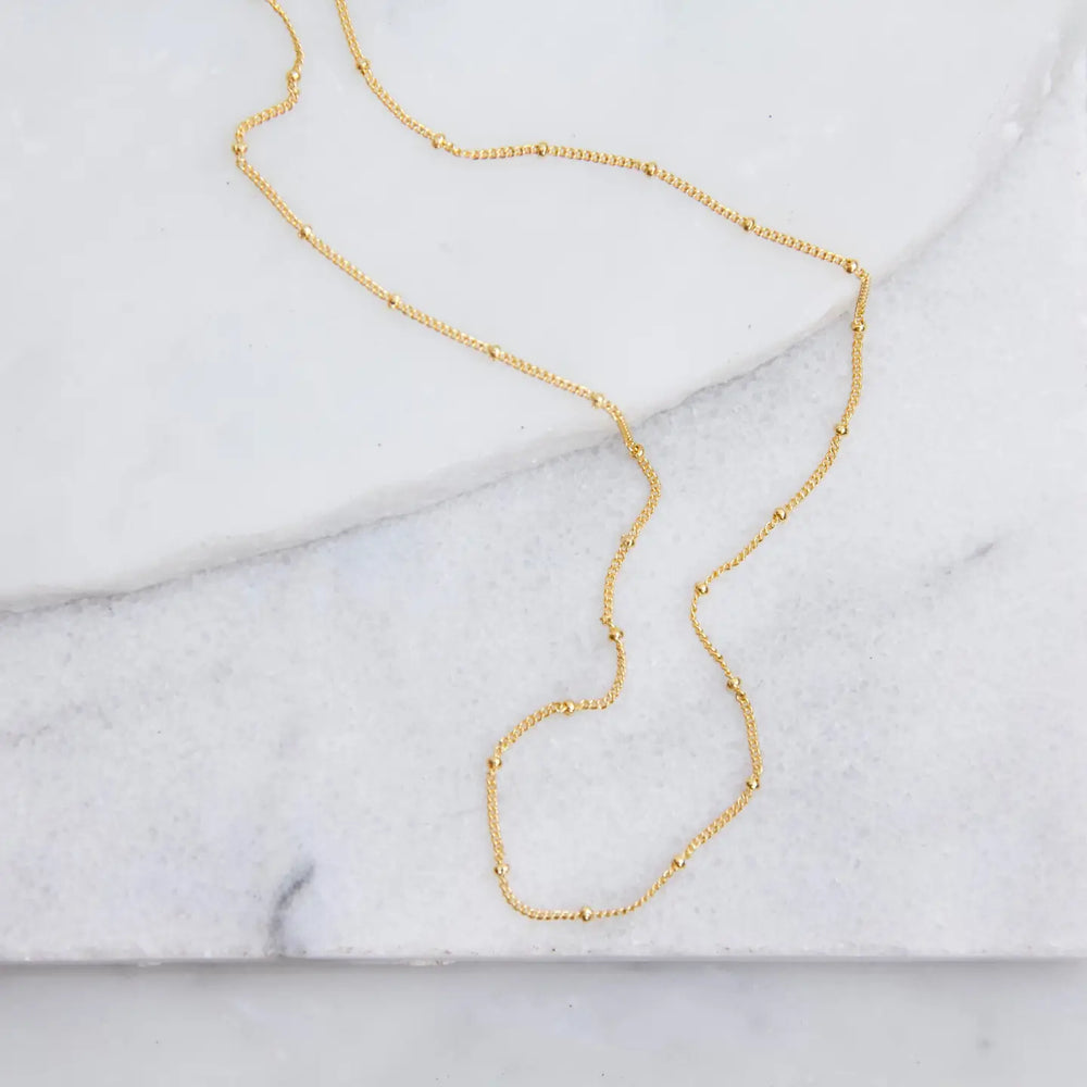 
                      
                        The Gold Satellite Chain necklace by Mesa Blue
                      
                    