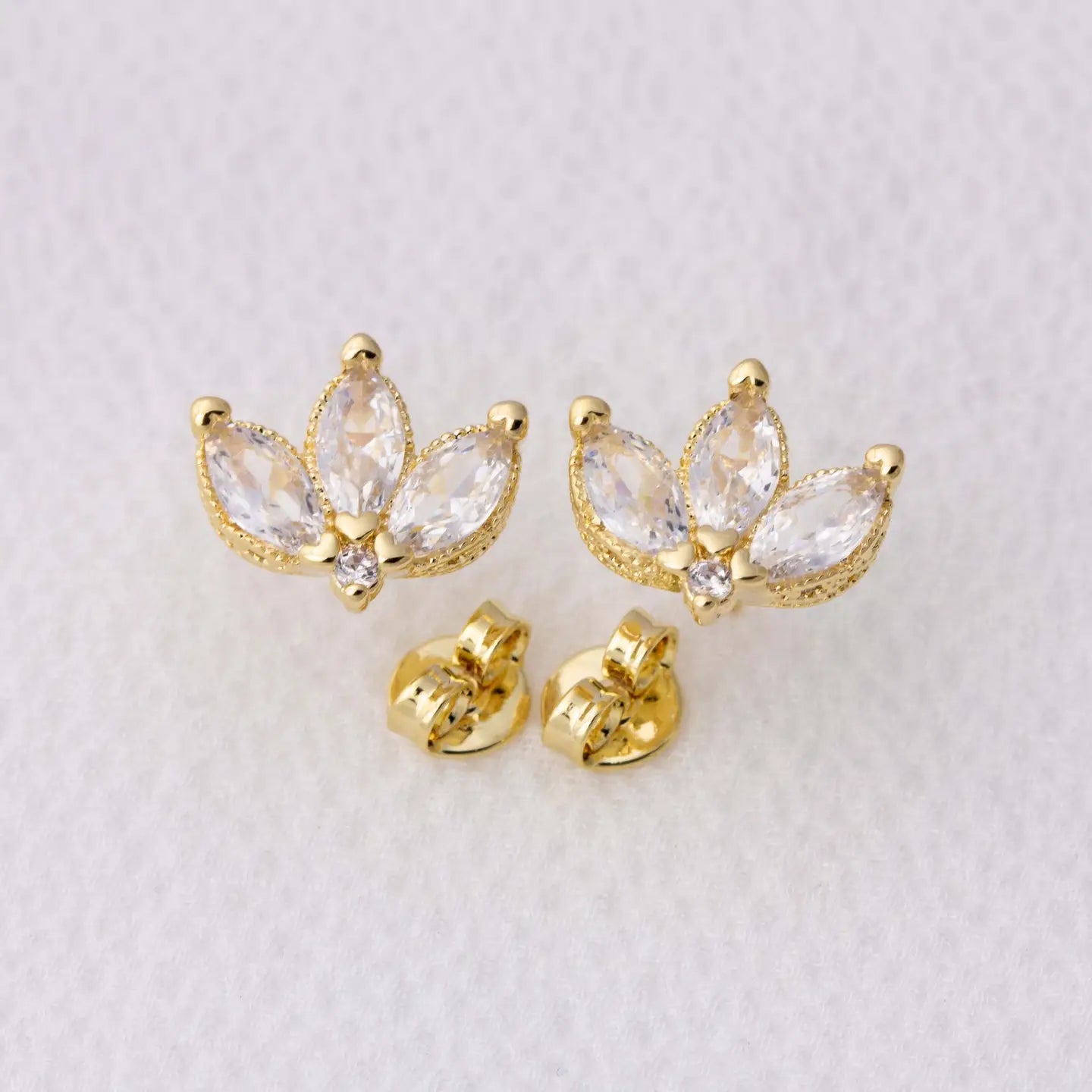 Lotus flower studs by Goldfi measuring 11.5mm x 9.5mm