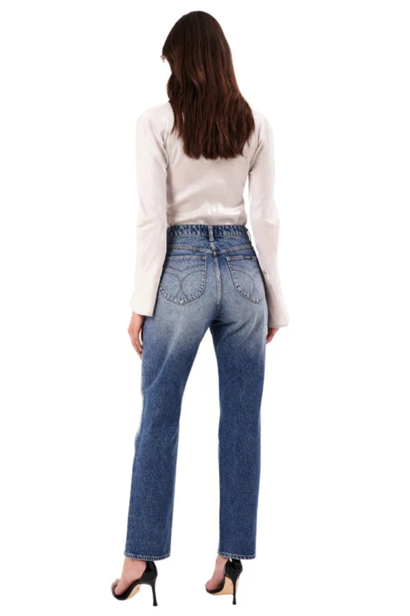 Back view of a woman wearing the 90s Relaxed Christy Jeans by Rolla’s