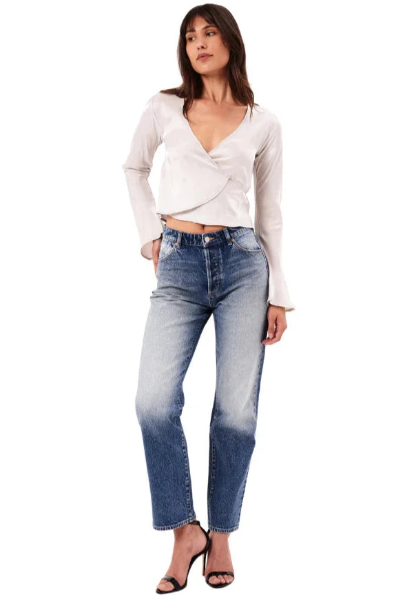 
                      
                        Front view of a woman wearing the 90s Relaxed Christy Jeans by Rolla’s
                      
                    