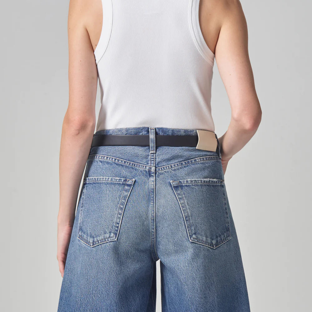 
                      
                        Back view of model wearing a white ribbed tank by Citizens of Humanity
                      
                    