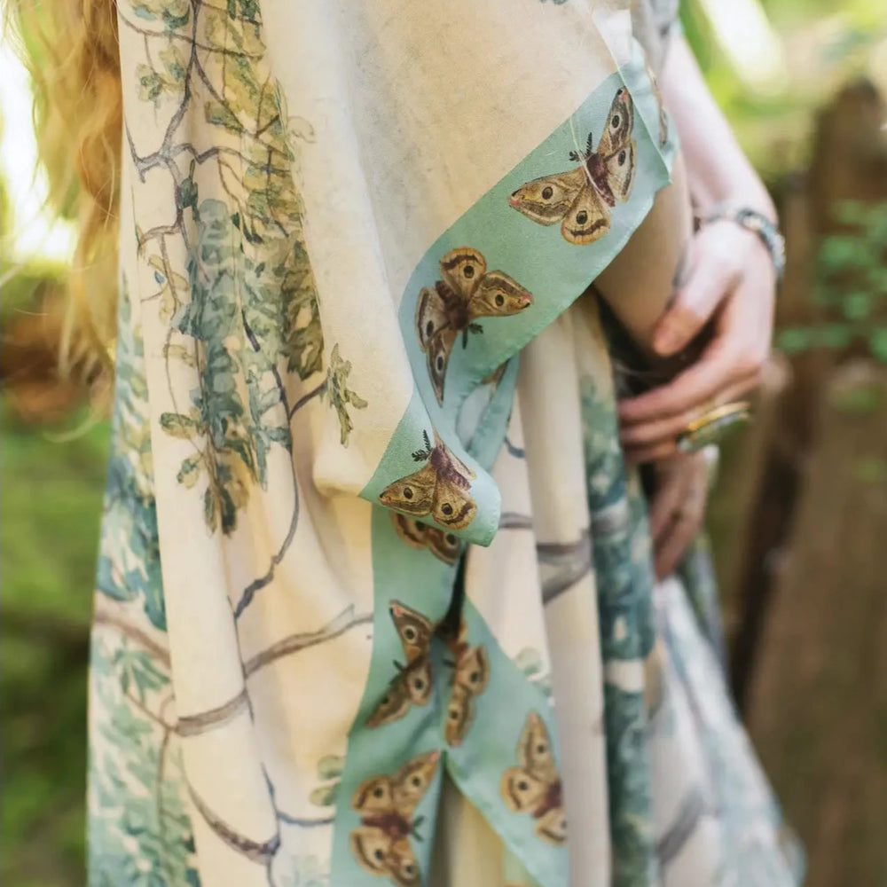 
                      
                        Butterfly trim detail on the Earth and Sky Bohemian Bamboo Kimono by Market of Stars
                      
                    