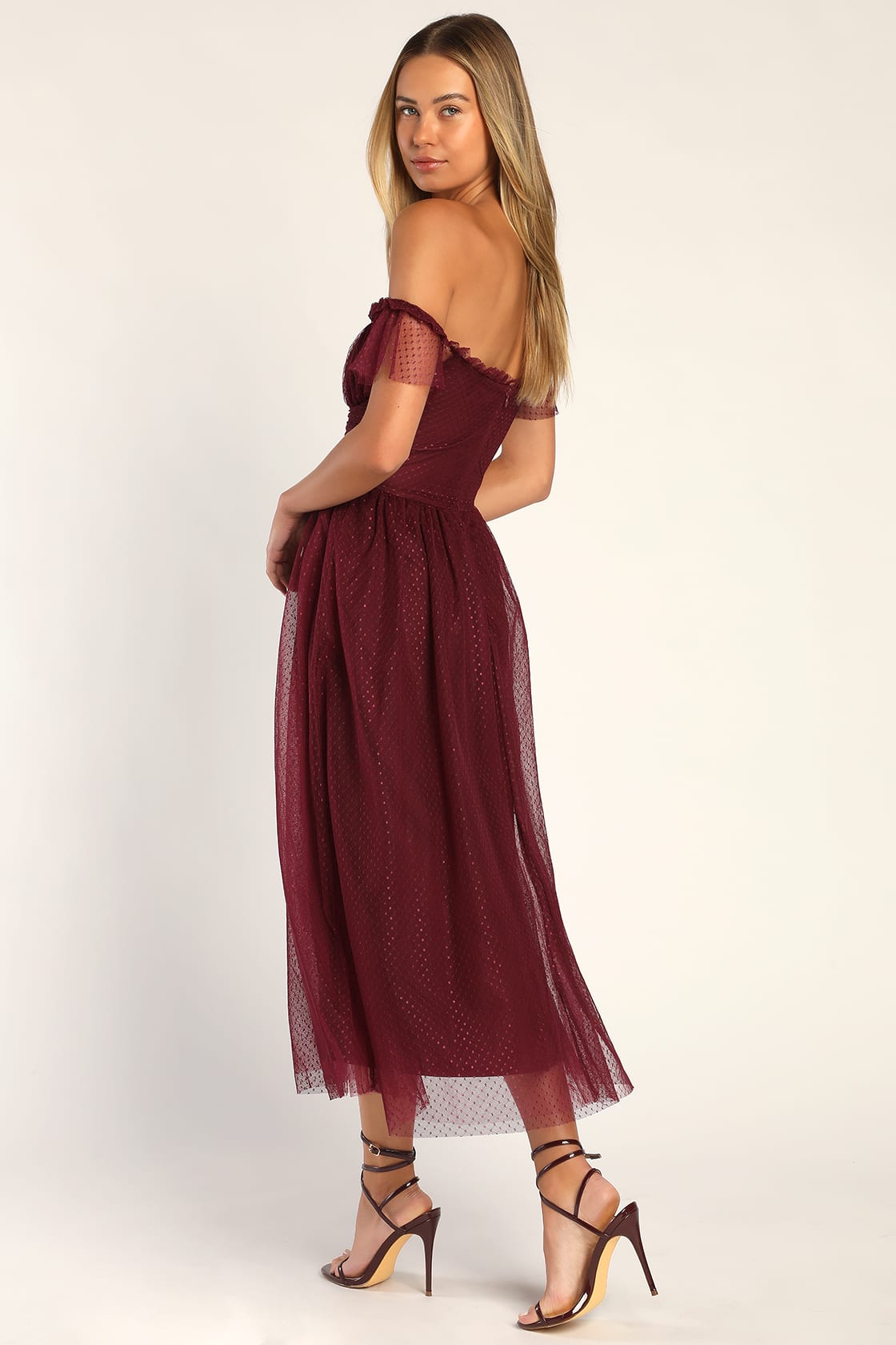 Back view of a woman wearing the Radiance Burgundy Tulle Bustier Midi Dress by Lulus