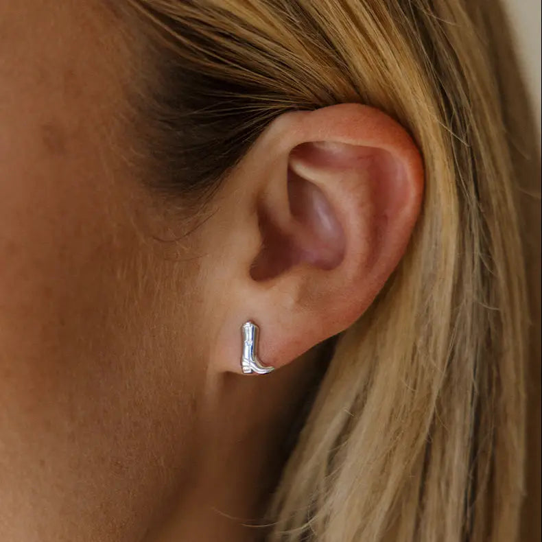 
                      
                        The Land Of Salt Gold Cowgirl Boot Stud Earrings
                      
                    