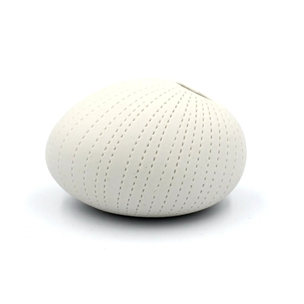 
                      
                        White Pebble Mini Porcelain Bud Vase
                      
                    