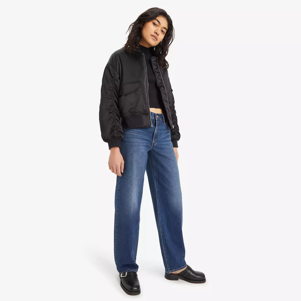 
                      
                        An outfit styled with the She's Nice Dark Wash Baggy Dad Women's Jeans by Levi's
                      
                    