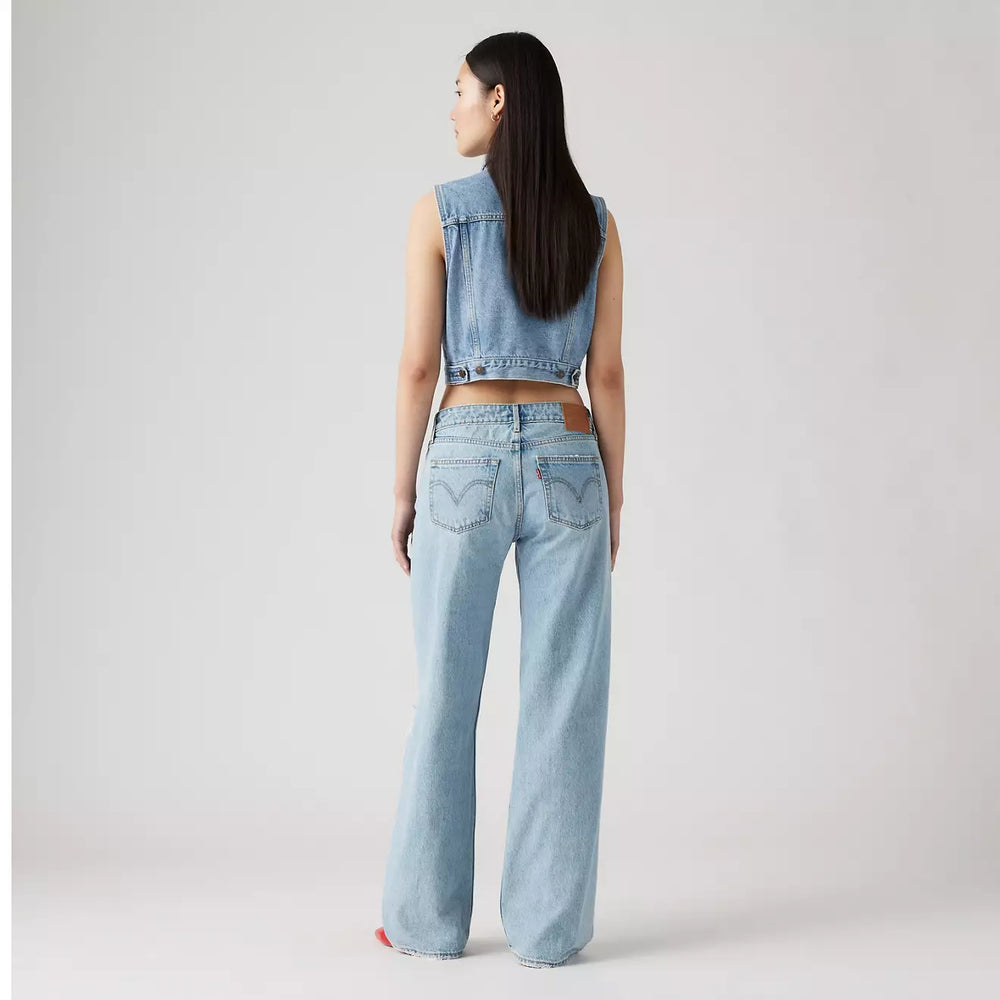 
                      
                        Back view of a woman wearing the Probably Ok Light Wash Distressed Low Loose Women's Jeans by Levi’s
                      
                    