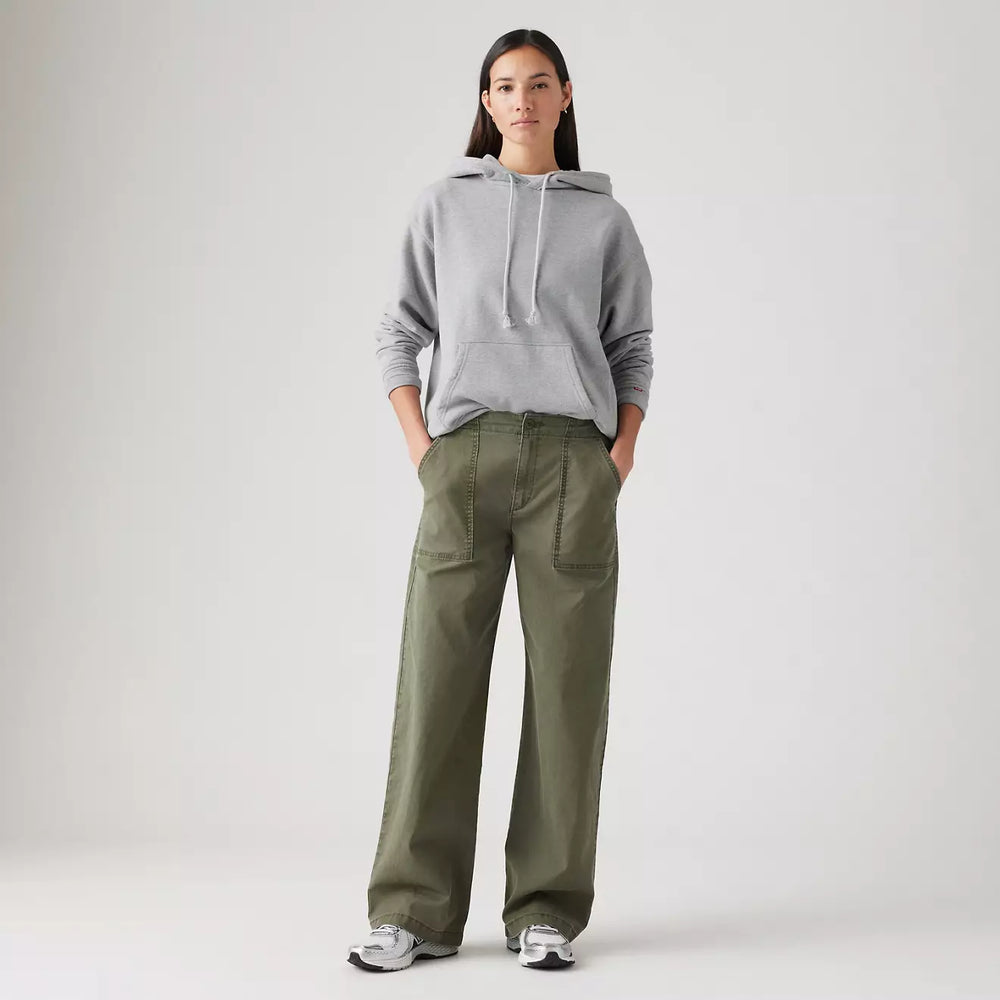 
                      
                        Front view of a woman wearing the Olive Green Surplus Straight Women's Pants by Levi’s
                      
                    