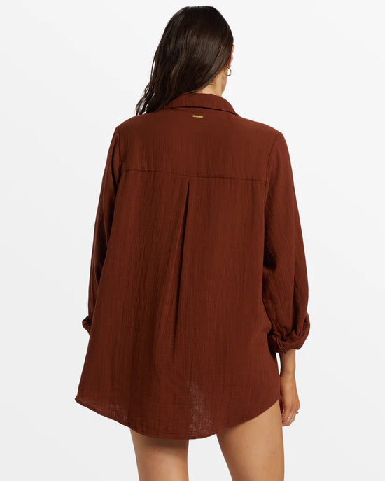 Back view of Billabong's Swell Button Up Blouse in the color Toasted Coconut