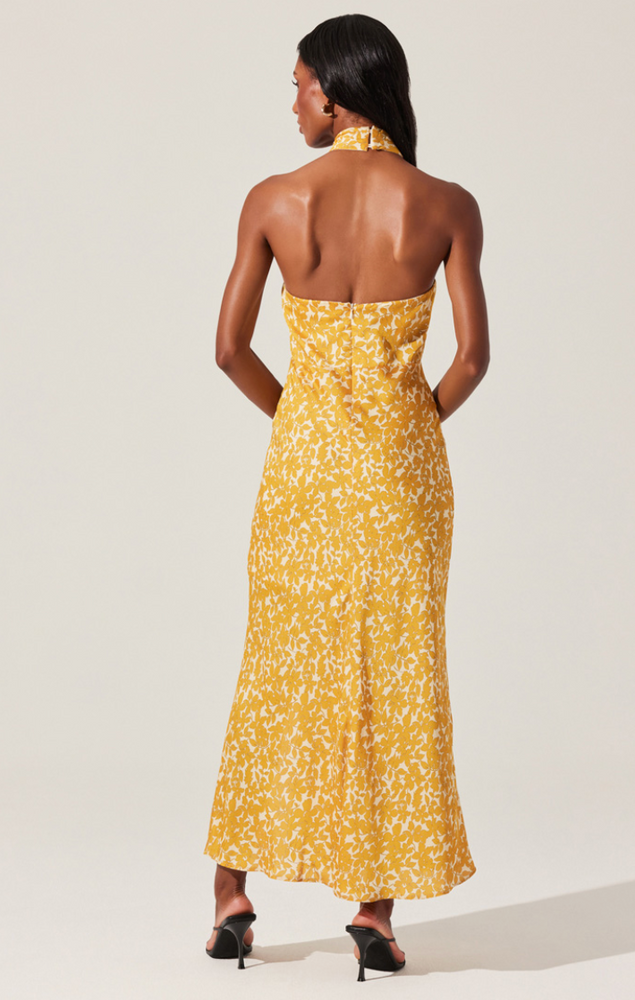 
                      
                        Yellow floral criss cross halter dress
                      
                    