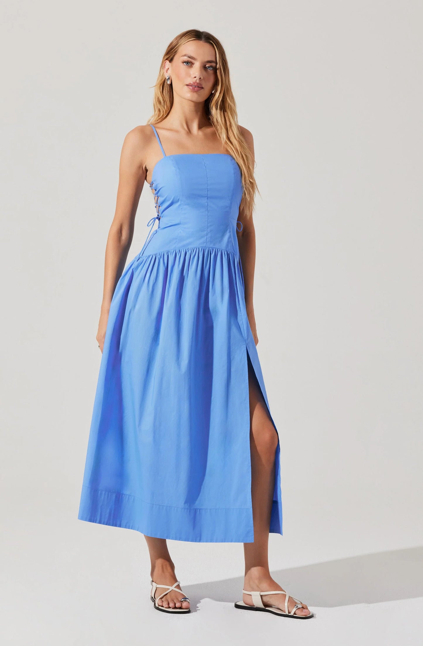 Take on summer events in style with the ASTR Karah Drop Waist Cutout Dress. Shop yours at Harbour Thread in Burlington, VT. 