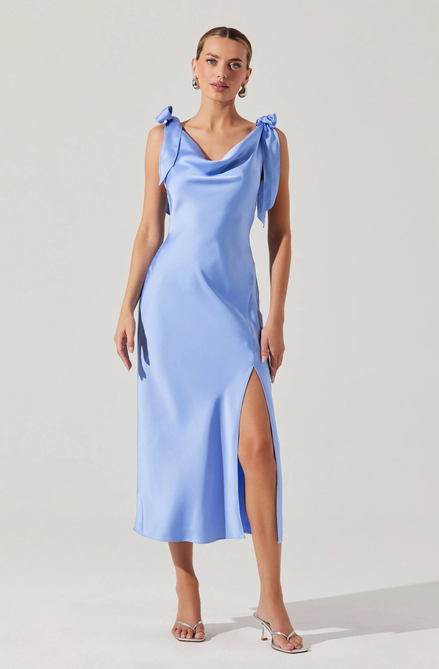 The Allexina Satin Midi Dress by ASTR is perfect for weddings, celebrations, and everything in between. Find yours at Harbour Thread boutique in St. Pete, FL!