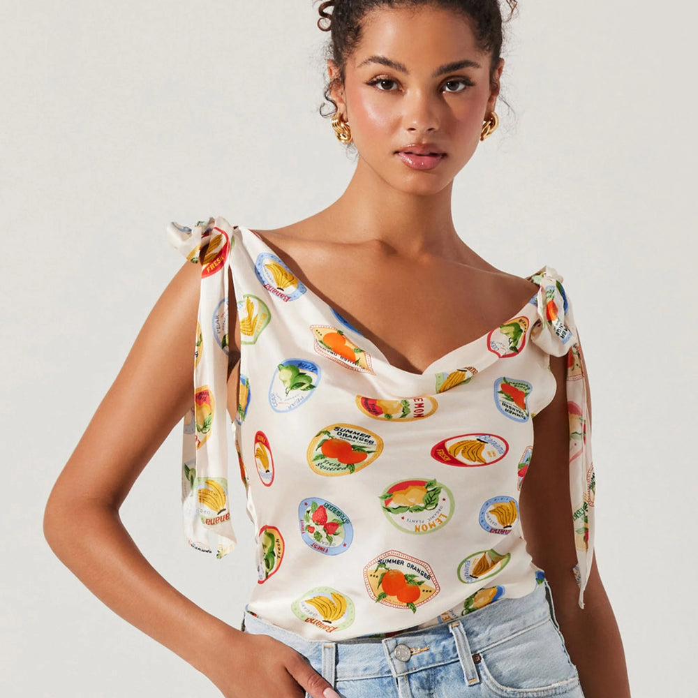 Embrace fun, feminine style with the Allexina Satin Tie-Shoulder Top from ASTR. Elevate your casual summer style at Harbour Thread in St. Pete, FL!