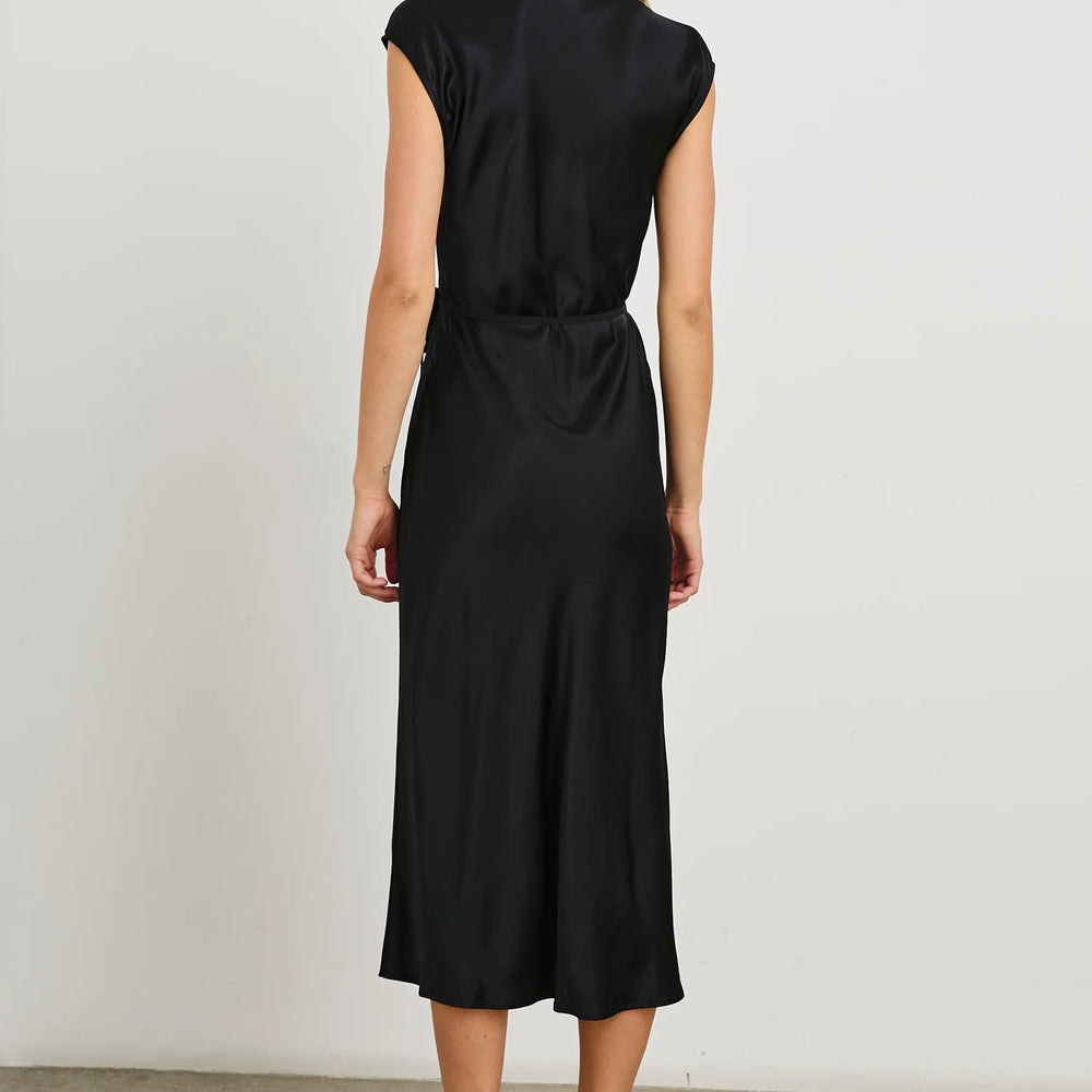 
                      
                        Back view of a woman wearing the black Alai wrap midi dress by the brand Rails
                      
                    