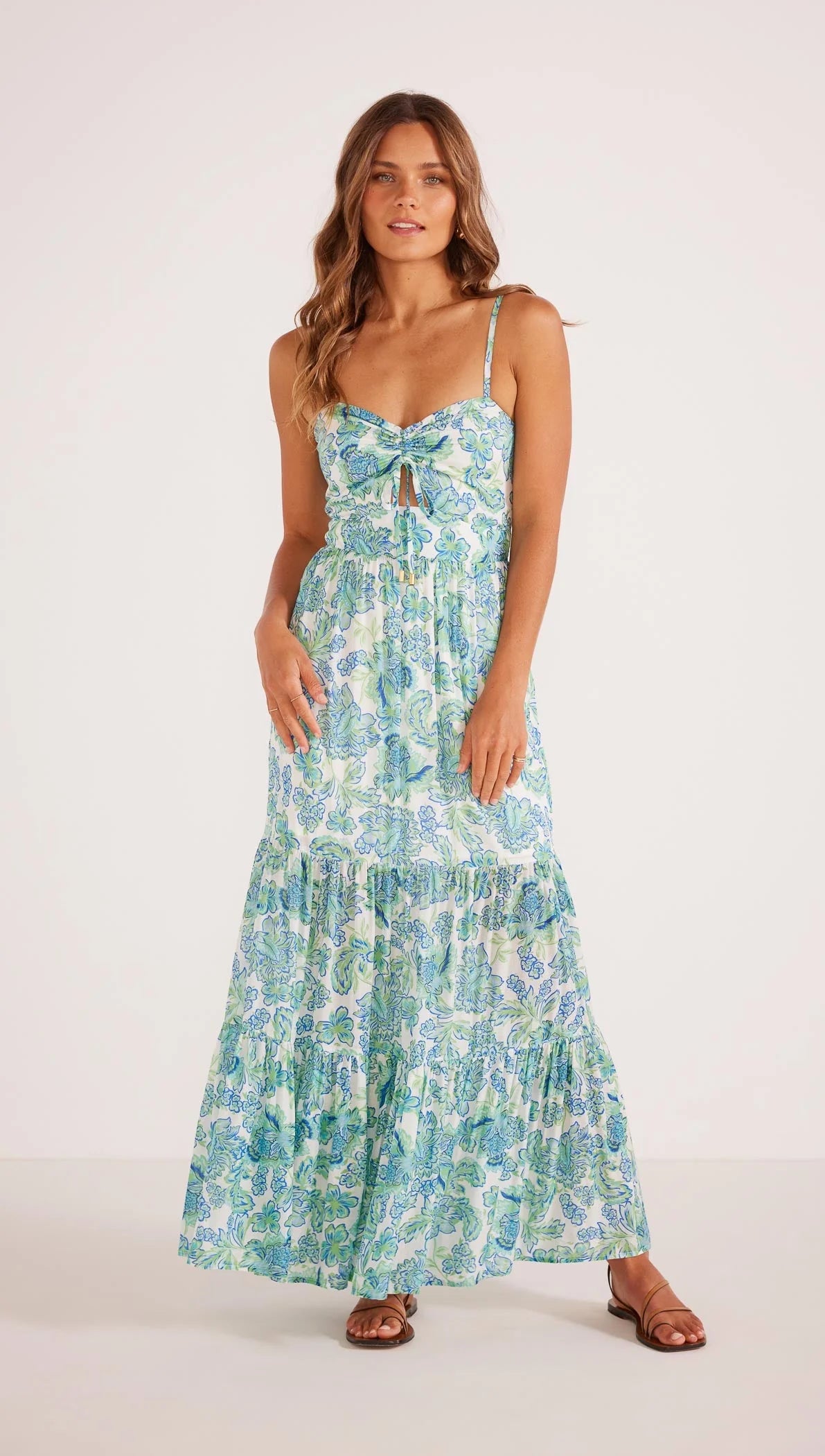 The blue and green floral Aessia Tiered Maxi Dress by MINKPINK