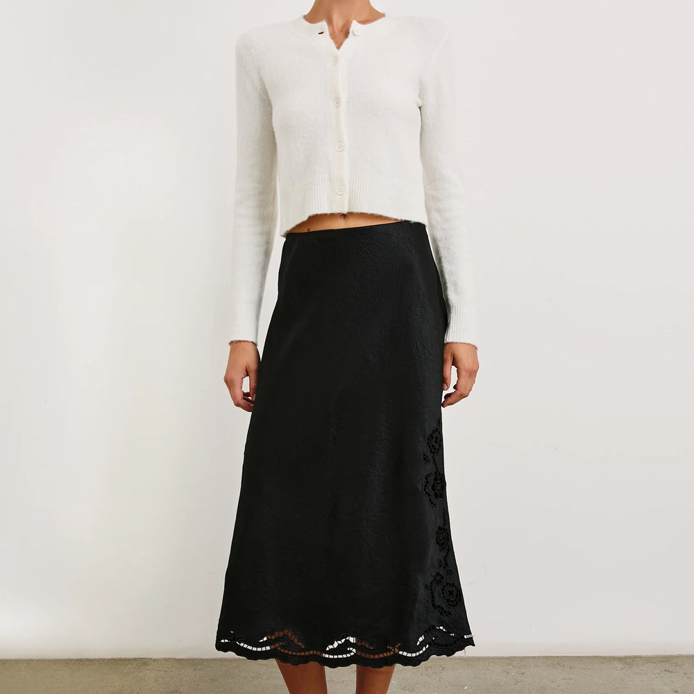 
                      
                        An outfit styled with the Black Eyelet Anya Skirt by the brand Rails.
                      
                    