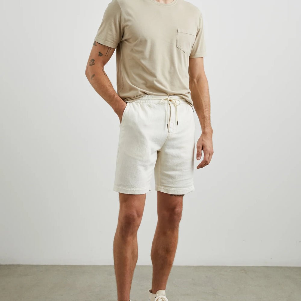 
                      
                        Man wearing the Ecru Archer Short from Rails
                      
                    