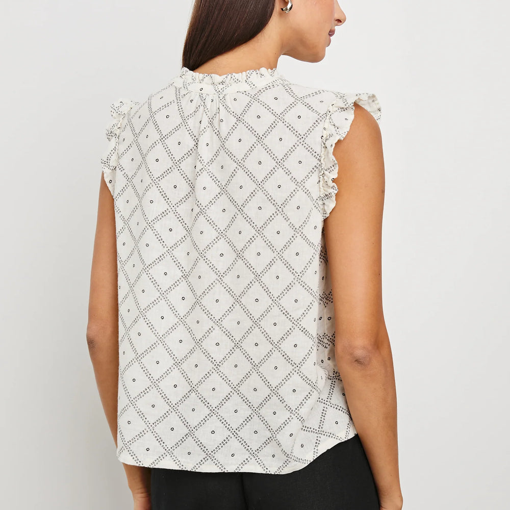 
                      
                        Relaxed fit blouse with ruffles at sleeve cuffs
                      
                    