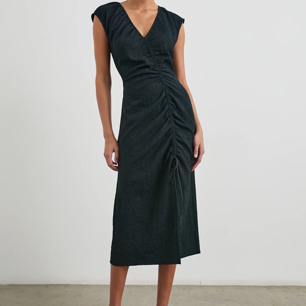 
                      
                        Front view of a woman wearing the Black Jacquard Auren Midi Dress by the brand Rails
                      
                    