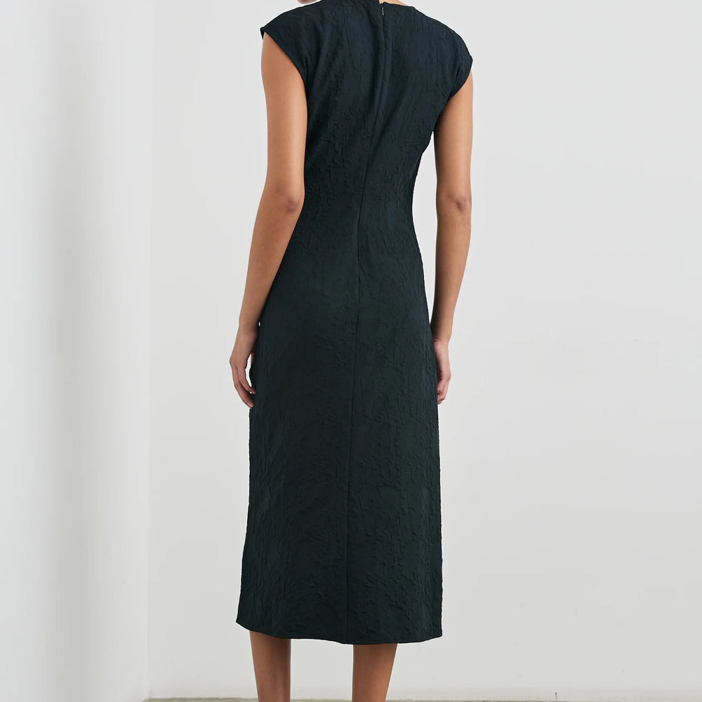 
                      
                        Back view of a woman wearing the Black Jacquard Auren Midi Dress by the brand Rails
                      
                    