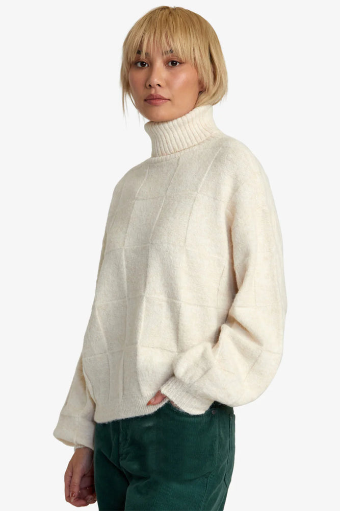 
                      
                        Side view of the Vineyard Sweater in the color Oatmeal by RVCA
                      
                    